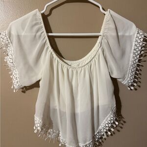 White Flutter Sleeve Blouse with Ruffled Asymmetrical Design